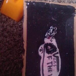 1 white and black bracelet and 1 black bracelet